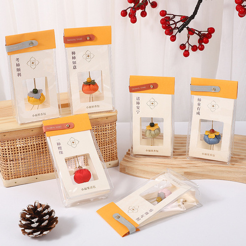 Mini persimmon-shaped sachet with sandalwood for the Dragon Boat Festival at Lingyin Scenic Area, bringing good luck and the wish for 