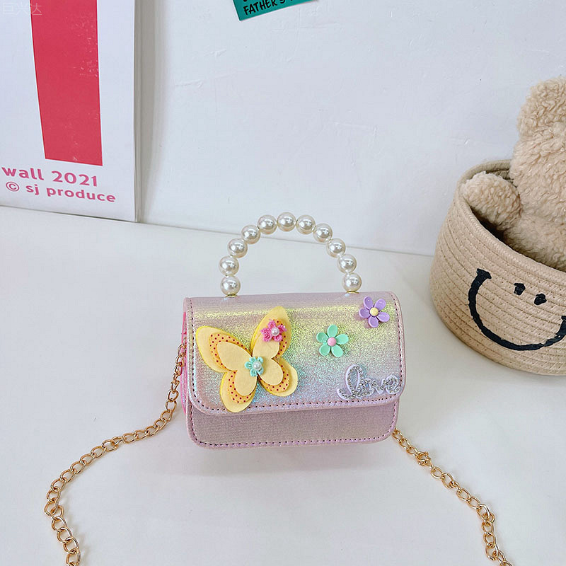 2025 primavera y verano estilo caliente moda casual niños dulces bolsa de gelatina mini bolso de mensajero de un solo hombro variedad al por mayor