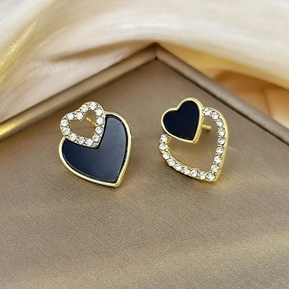 Aguja de plata de moda alta sensación de diamante de goteo de aceite pendientes nicho universal elegante pernos de orejas ligero lujoso temperamento simple orejas para mujeres