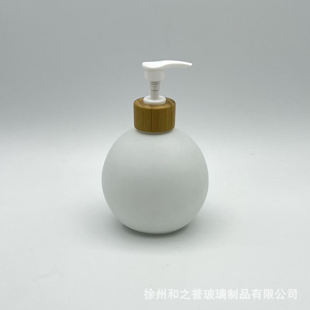 Botella de desinfectante de manos de presión de lujo ligera botella de bomba de emulsión redonda botella de jabón botella de champú de alto valor facial impresión de botella de agua