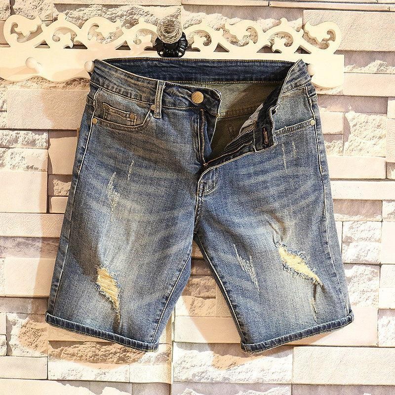 Verano marca de tendencia hombre jeans jeans de estilo coreano retro pantalones cortos rectos agujeros lavados con agua para hacer pantalones viejos