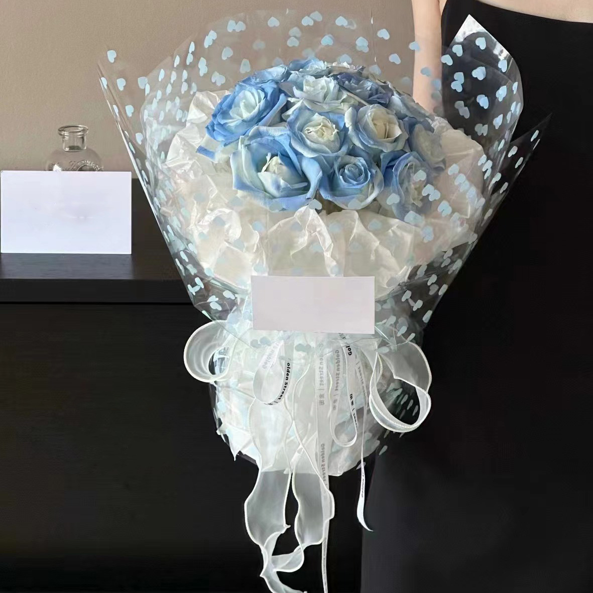 Fábrica de fiestas de flores al por mayor nuevos productos de impresión de amor de papel de vidrio flor de embalaje de flores transparente florista embalaje de papel