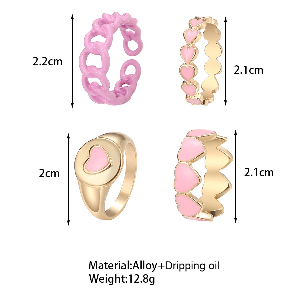 Cross-border Ins New Style Pink Love Heart-shaped Ring Set Creative Sweet Peach Heart Drop Oil Ring Color Retention Four-piece Set display picture 1