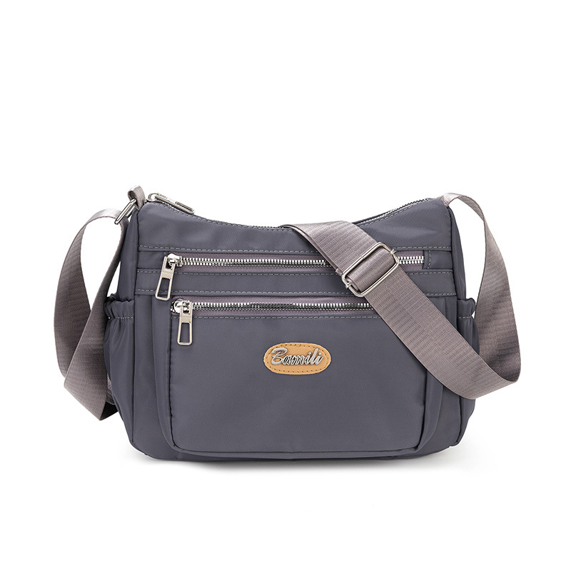Bolso explosivo, tela de nailon para mujer, bolso de mensajero casual de gran capacidad, bolso de hombro ligero simple para madre de mediana edad para mujer
