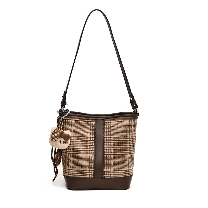 Otoño y invierno retro bolsas de nicho a cuadrícula para mujeres 2025 nuevo tipo de bolso de hombro de braza, bolso de cubo de agua