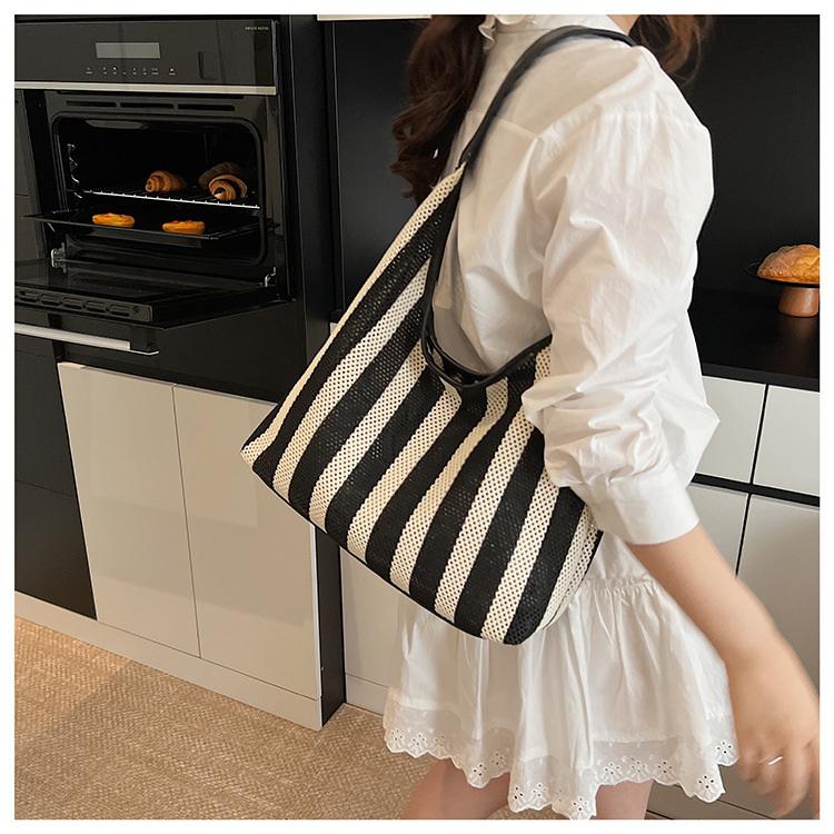 Korean summer new striped woven bag, casual vacation and laid-back style tote bag, hand and shoulder commuter tote bag undefined
