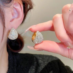 金色の耳飾り ~ 冷たい風の金属の質感の耳の輪のピアスの女性の個性はファッションの欧米の風の爆発的なイヤリングを合わせます。|undefined