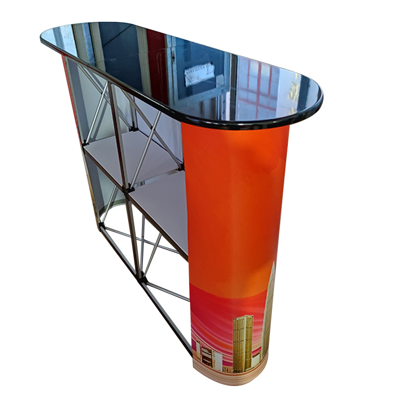 Mesa de promoción de malla de tracción arqueada personalizada exposición centro comercial placa de pintura de absorción recepción de recepción estante de publicidad de lujo stand