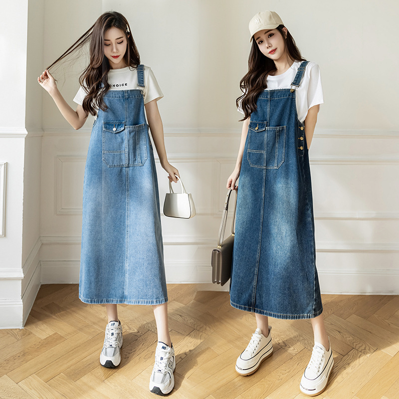 Real Shot of the 2026 Spring/Summer New Korean-Style Loose Casual Versatile Denim Suspender Dress, Mid-Length Slimming Dress for Women Real Shot of the 2026 Spring/Summer New Korean-Style Loose Casual Versatile Denim Suspender Dress, Mid-Length Slimming Dress for Women