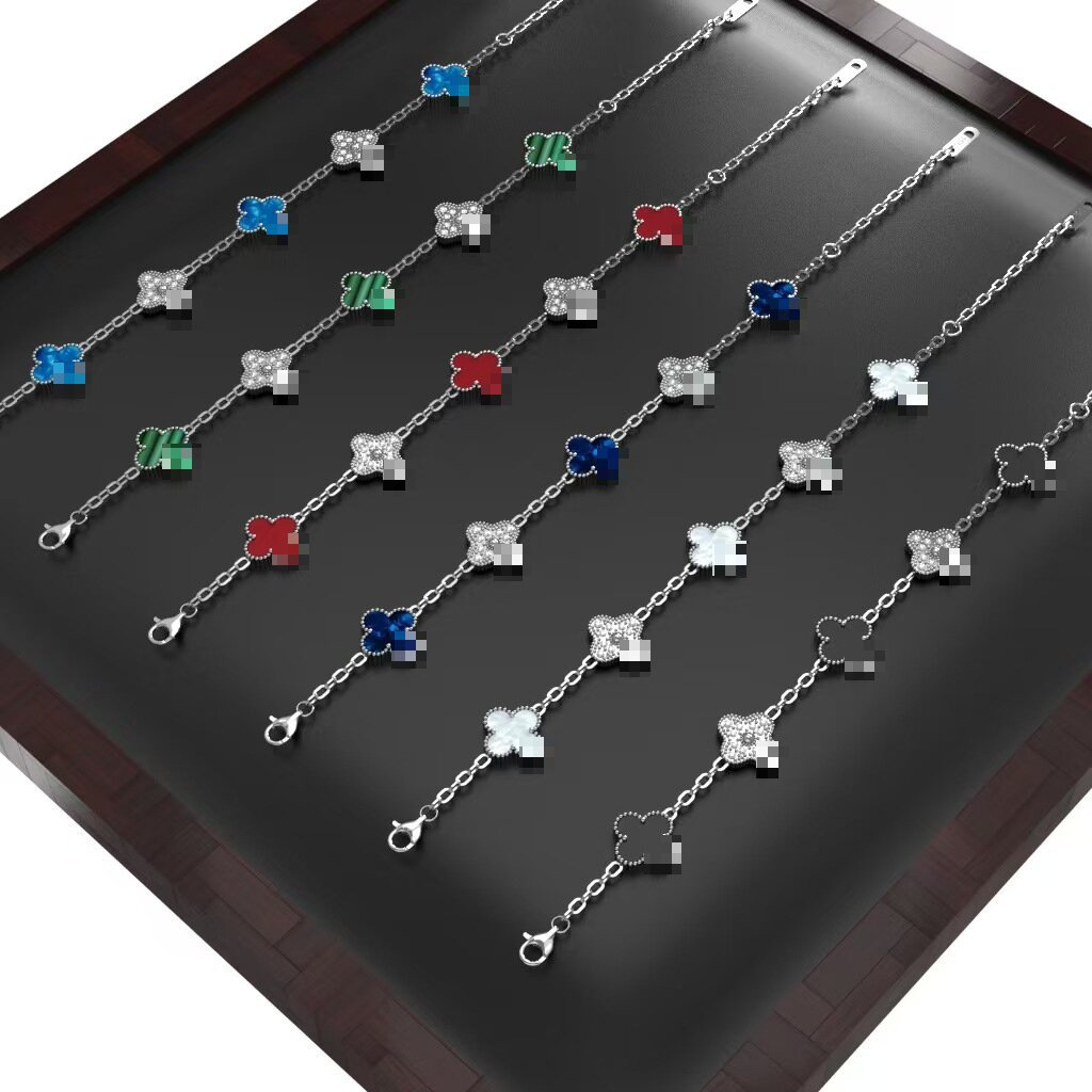 跨境爆款钛钢13MM四叶草手链双面镶钻颅内真空不掉色韩版潮流