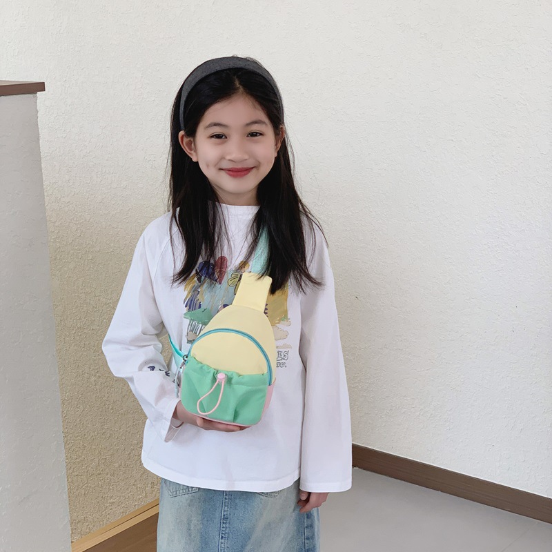 Moda coreana para niños y niñas bolsas de pecho de color contrastante, mini bolsas de bebé 2026 nuevas bolsas para niños