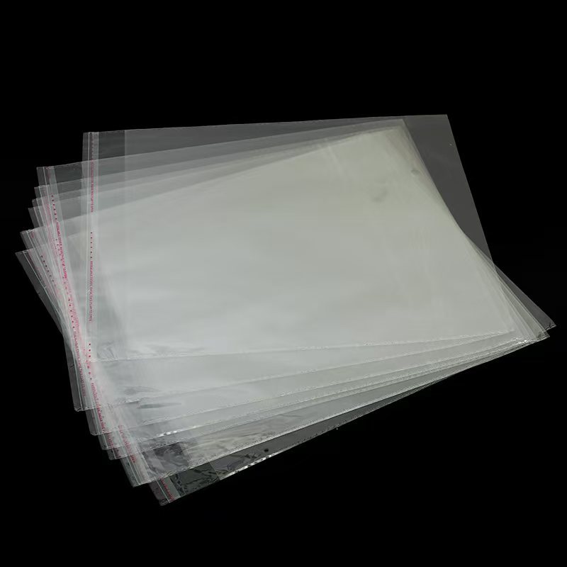 Bolsa autoadhesiva OPP 15 * 24 embalaje de ropa transparente bolsa de plástico embalaje de joyería bolsa de sello bolsa adhesiva bolsa autoadhesiva