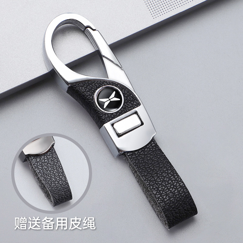 Llavero de automóvil transfronterizo, logotipo del automóvil, cientos de apellidos, botones de cuero de alta gama, colgante de llavero de negocios simple y personalizado