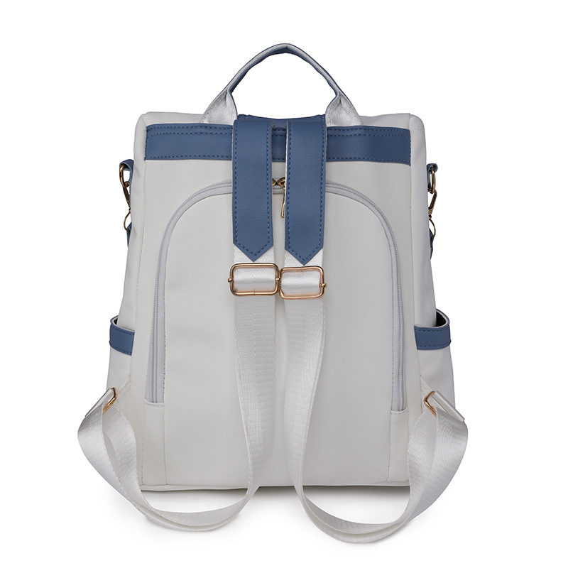 Bolso mujer 2023 nueva mochila de nailon para mujer coreana simple y versátil mochila de color de contraste ligero al aire libre al por mayor