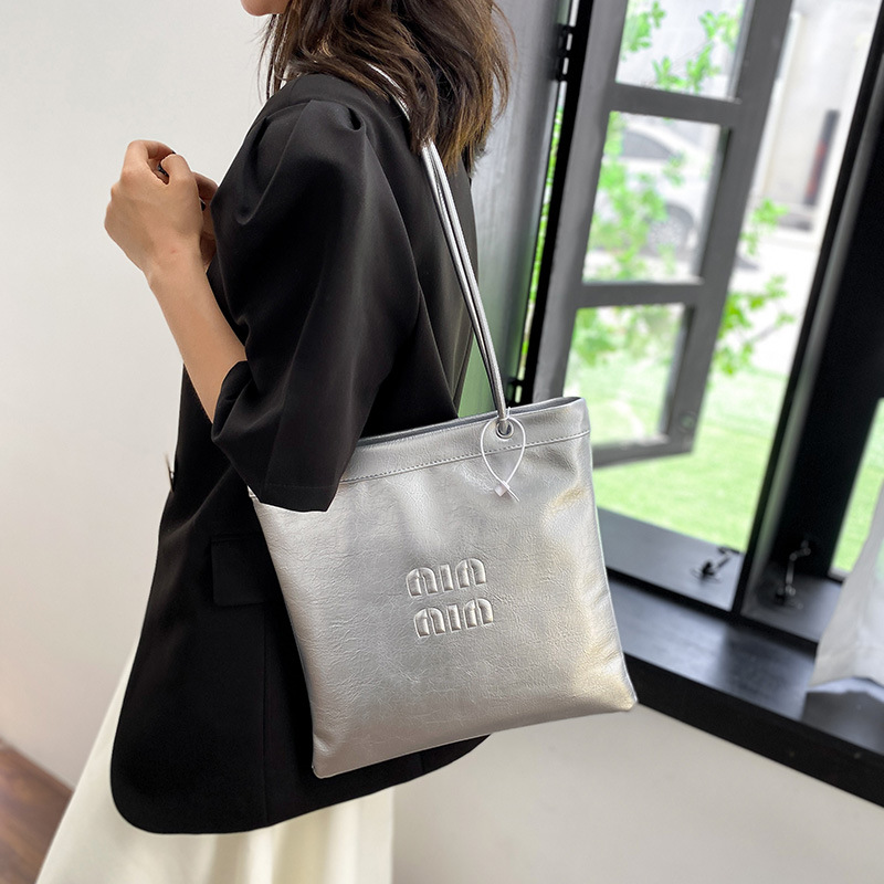Bolso tote nuevo 2025, moda para ir al trabajo, bolso de hombro de gran capacidad, bolso informal y elegante, bolso versátil para mujer con cremallera