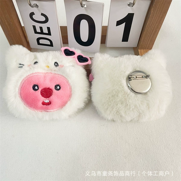 KT brooch style