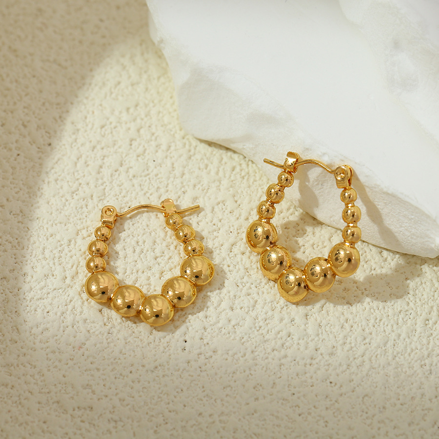 Europa y los Estados Unidos transfronterizos diseño geométrico de alto nivel de nicho de acero inoxidable personalidad de moda orejas