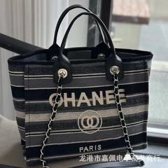 デニムの高バージョンのビーチバッグ24新型のストライプが色にぶつかって旅行します。