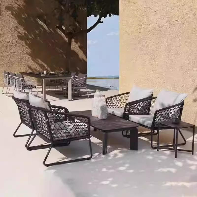 Sofá nórdico de teca al aire libre combinación de villa balcón al aire libre silla de caña ocio jardín al aire libre cuerda tejida muebles de madera maciza