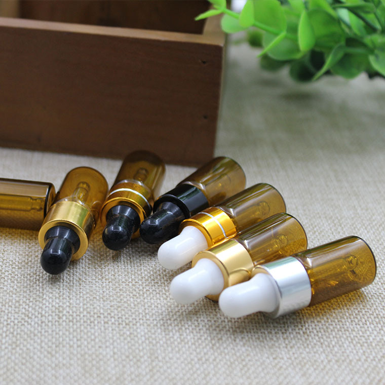 En stock lote de botella de aceite esencial marrón 3ml botella de vidrio pequeña muestra de prueba sub-botella de embalaje cosmético botella vacía