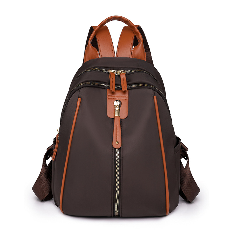 Mochila de nailon para mujer 2024 nueva moda anti-salpicaduras para mujer mochila de concha estilo occidental bolso de viaje de ocio