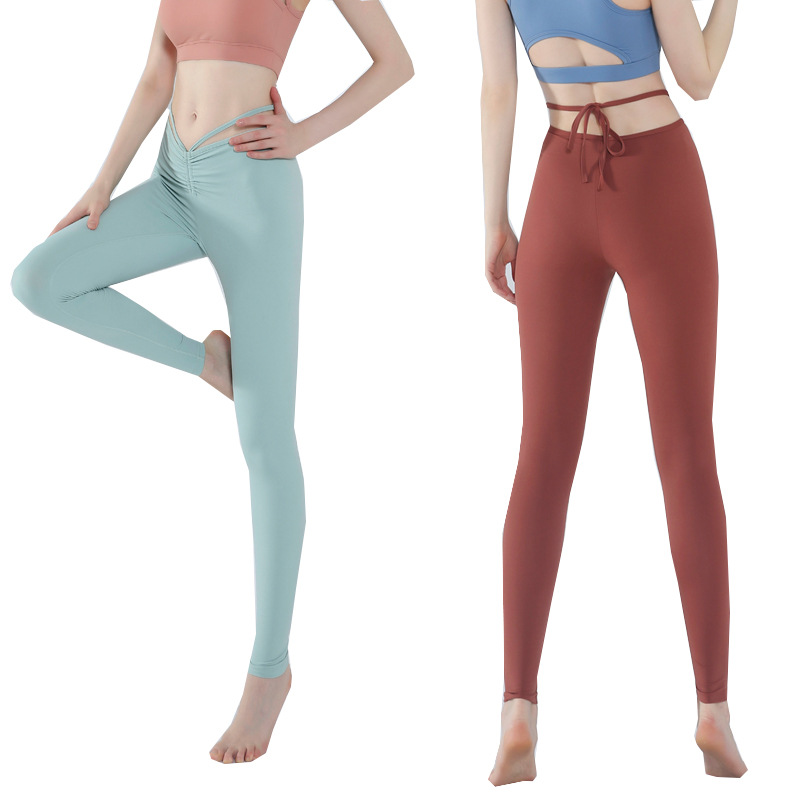 Pantalones de yoga para mujer 2021 Nuevos pantalones cortos ajustados con cordones de cintura alta desnuda corriendo baile de secado rápido pantalones de fitness elásticos altos