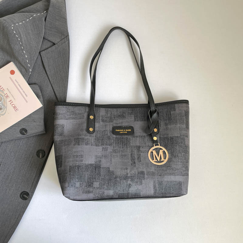 Bolsa grande 2026 nueva pequeña fresca mochila de viaje al trabajo, gran capacidad de bolsas de mano de alta popularidad este año
