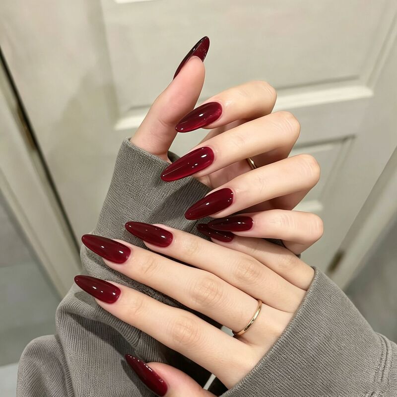New minimalist-style nail art: elegant wine-red cat-eye design, long teardrop-shaped press-on nails, wholesale