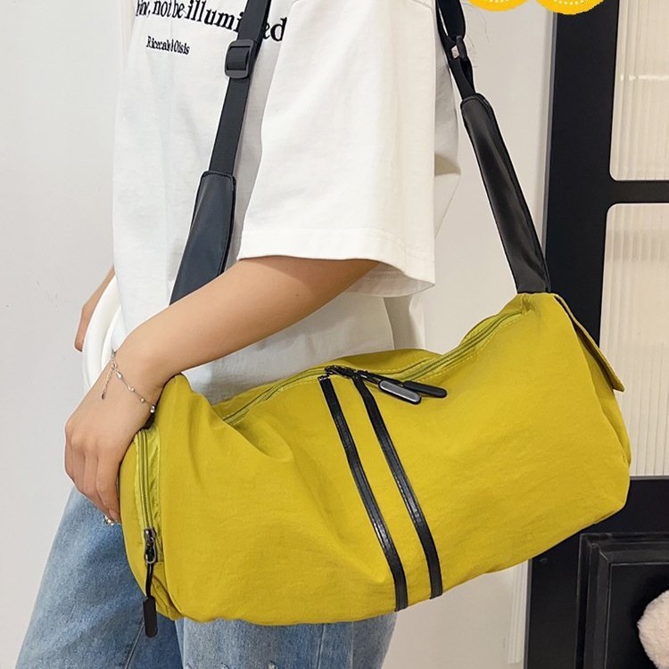 上新跨境大容量PU拼条枕头包波士顿休闲包青年休闲运动风大包包