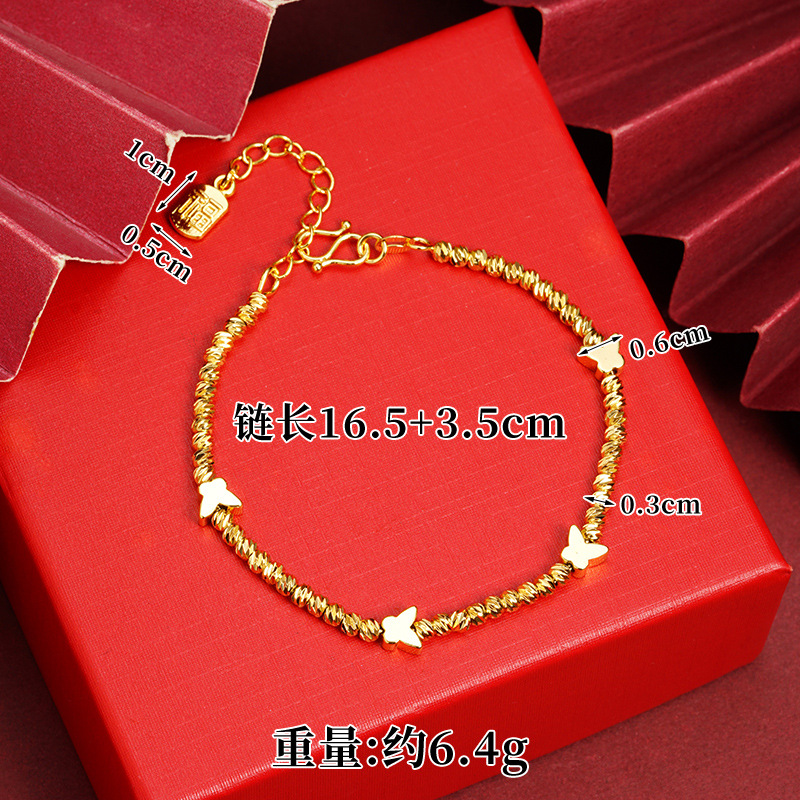 Brazalete de oro de arena de Vietnam lujoso ligero bungee ojo de gato mariposa campana de cuatro hojas brazalete joyería de aleación de cobre al por mayor
