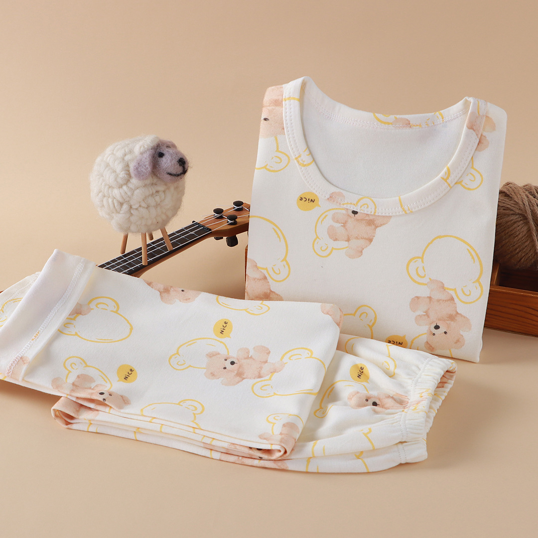 Nueva ropa infantil para el hogar sin huesos pijamas de manga larga primavera y otoño ropa de aire acondicionado de niñas algodón hombre