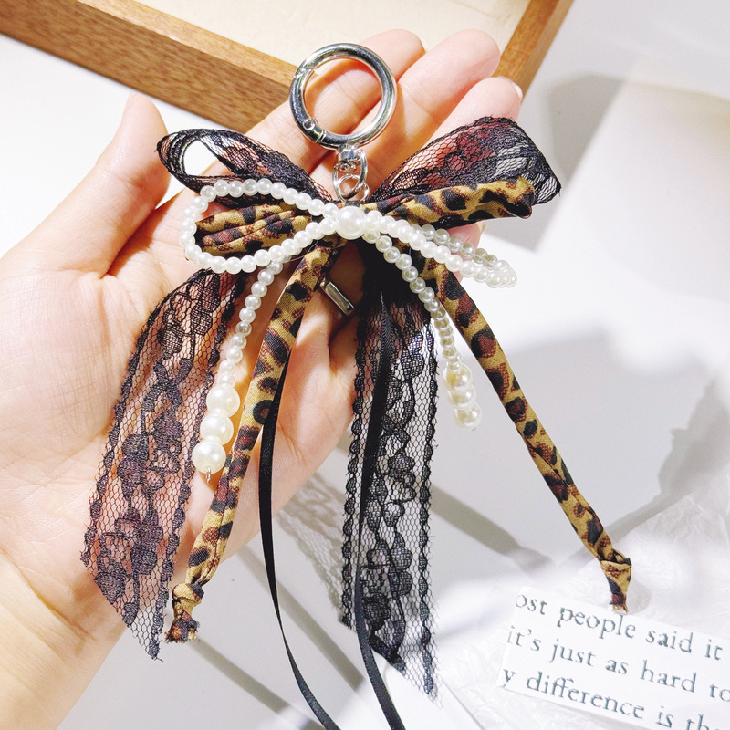 New Korean-style Leopard-print Ribbon Imitation Pearl Bow Cyber Celebrant Girl Bag Pendant Pendant Keychain Mobile Phone Chain