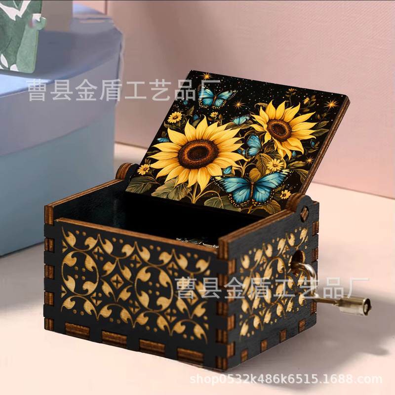 木製の手で音楽箱のアイデアを揺らします。|undefined