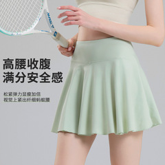 テニスのスカートの女性のヨガの白いバドミントンの百パートナーのスカートのフィットネスのスポーツのショートパンツのランニングの速乾の防走光のスカート
