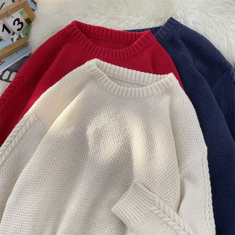 Demi-season solid knitted thin woolen sweater with a round collar
