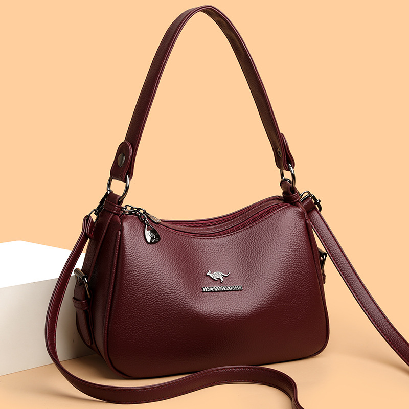 Bolso de hombro de mujer de temperamento de venta caliente transfronterizo, bolso de axila de viaje de trabajo de todo fósforo de moda, bolso de textura simple al por mayor