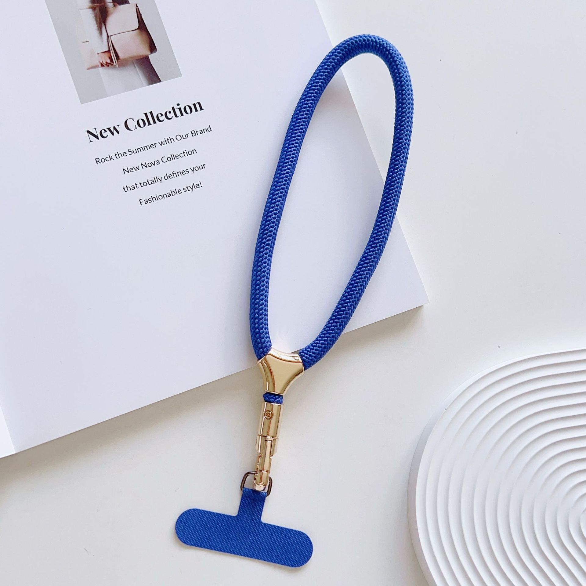 Cuerdas de muñeca ajustables de alta calidad con clips de hebilla pequeñas y frescas de poliéster corto para colgar teléfonos móviles simples y versátiles