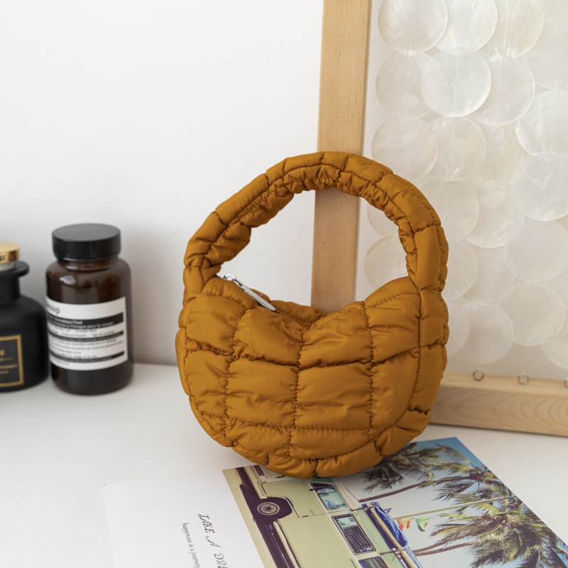 2024 nuevo bolso de nube con pliegues, mini bolso de mano de nicho coreano, chaqueta de algodón de plumón, bolso de mano, bolso de burbuja