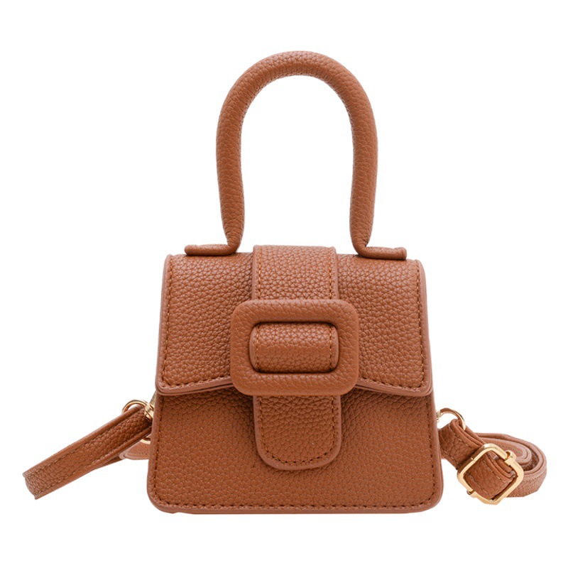 Bolsa para niños Otoño e Invierno Nueva moda europea y americana patrón de lychee mini bolsa de sillín retro hebilla de herradura bolso de las niñas