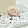 9# printed milky white colored candy fish hairpin