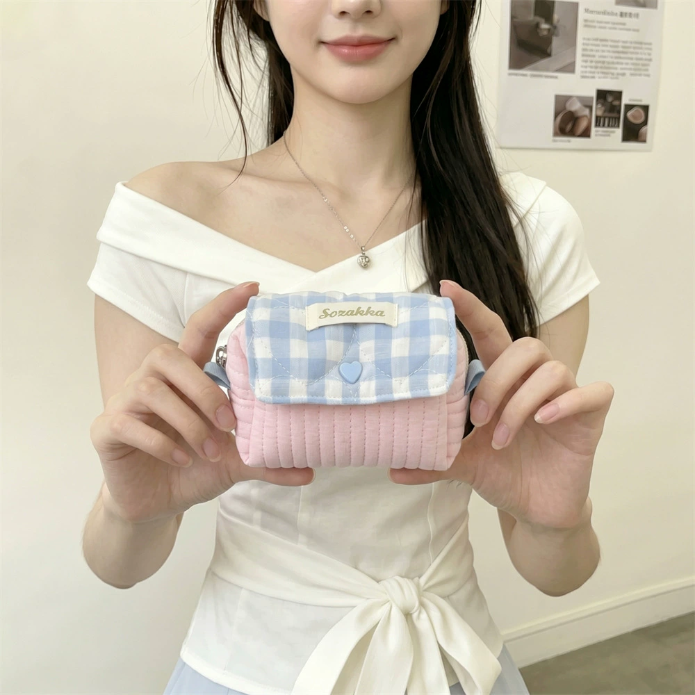 Camera, folding design organizer bag, handheld headphones, protective storage system