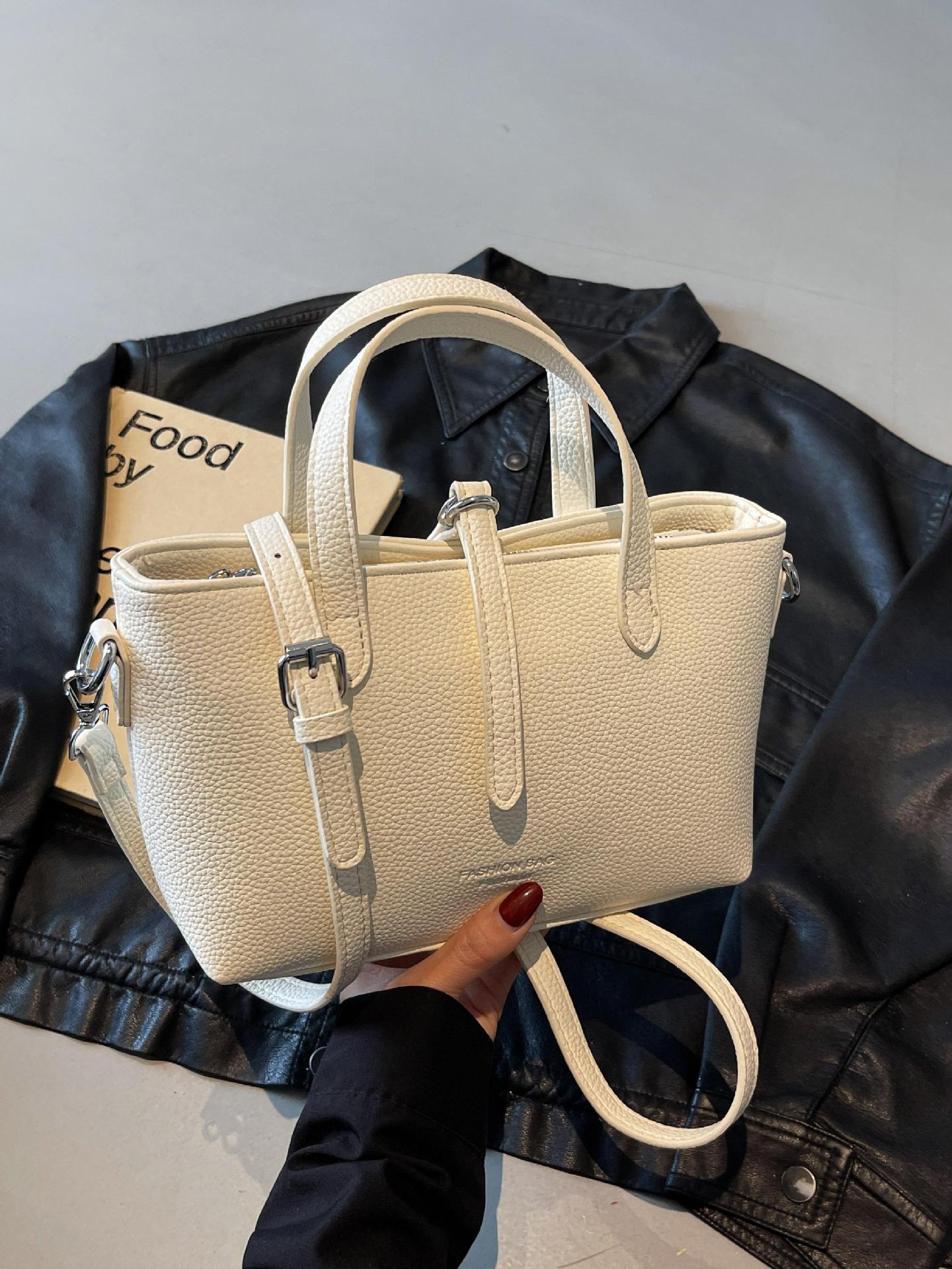 Bolso de mano simple de comercio exterior para mujer 2025 nuevo bolso de hombro de color sólido de todo fósforo bolso de mensajero de textura de moda popular