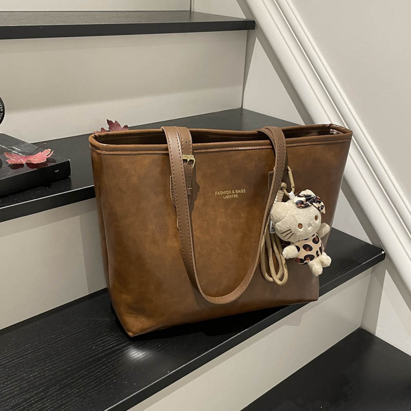 Bolsa de viaje retrógrada para mujeres 2026 otoño y invierno nuevo estilo versátil bolso de hombro de tendencia Maillard bolso de brazo