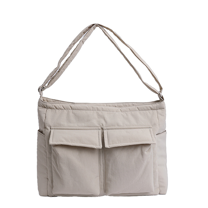 Bolsa de lona de explosión de comercio exterior para mujeres 2025 nuevo viaje multibolsillo bolso de gran capacidad para trabajar mochila de hombro