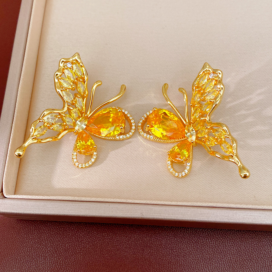 Oro verdadero electron-combustible mariposa de piedra pernos de orejas temperamento exquisito personalidad nicho pendientes ligero lujo conjunto de joyas de alta calidad
