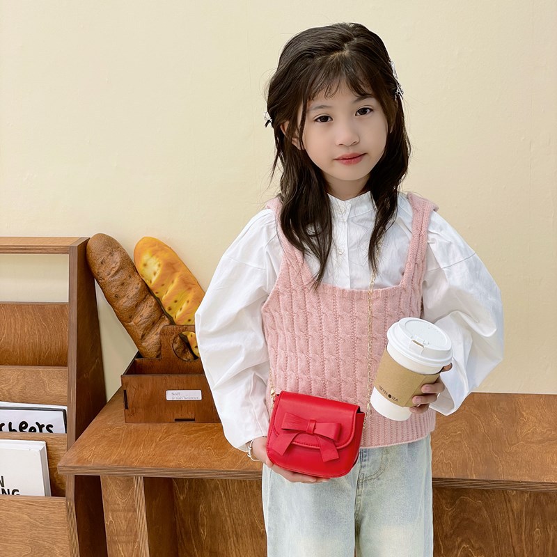 Bolsos de hombro de princesa de color sólido mini lindos bolsos de arco para niñas 2025 nuevos bolsos de cadenas para niños