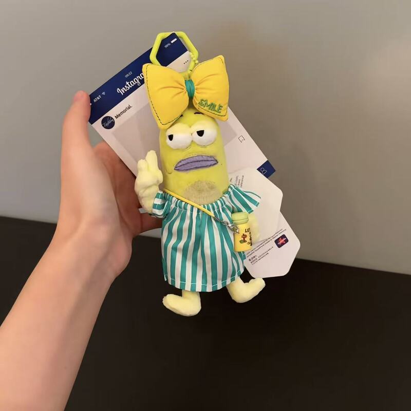 Official SpongeBob SquarePants Plush Toy Keychain, featuring the character Squidward, a cute and quirky design