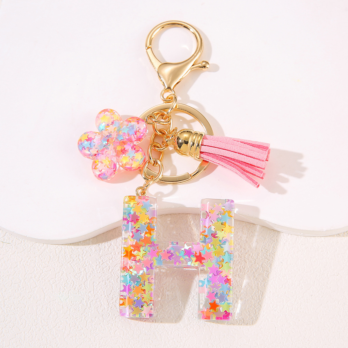 Un nuevo llavero flor de goteo de goma esquinilla 26 letras bolsos colgante llavero accesorios Yiwu