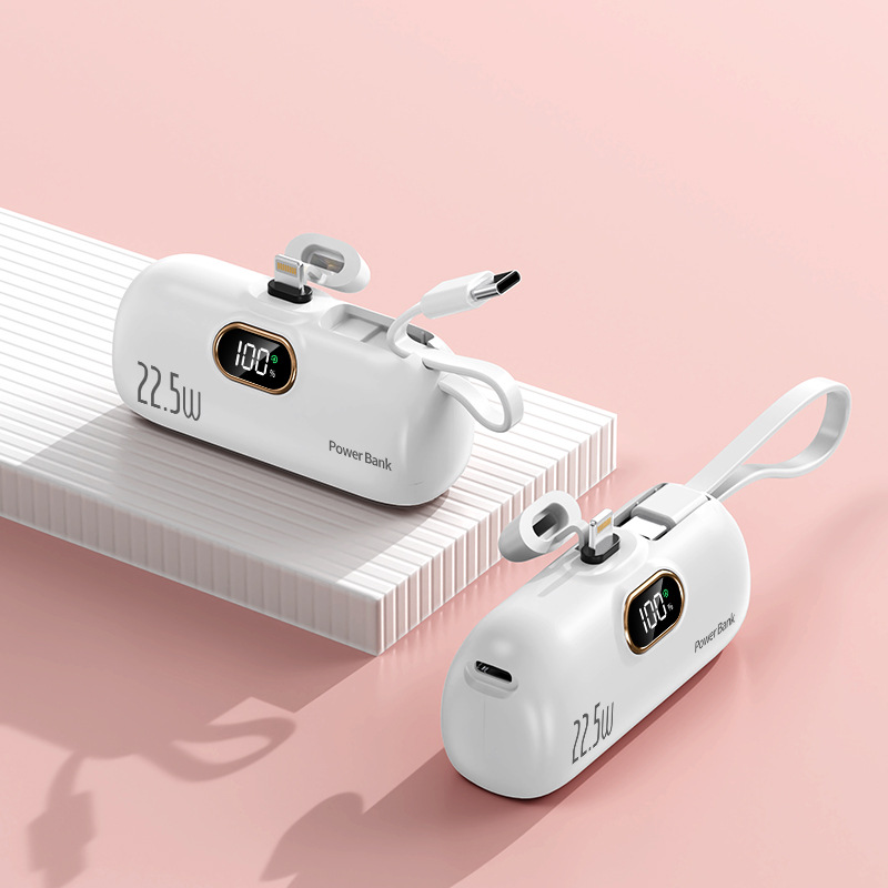 KC transfronterizo mini bolsillo portátil inalámbrico de carga rápida cápsula banco de energía 5000 mA pequeña energía móvil al por mayor