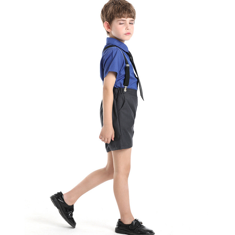 Verano de moda coreana corbata de color sólido camisa de manga corta para niños correa clip pantalones cortos vestido traje de rendimiento